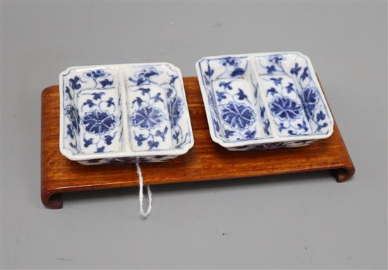 A pair of Chinese blue and white square dishes, Guangxu mark and period, hardwood stand